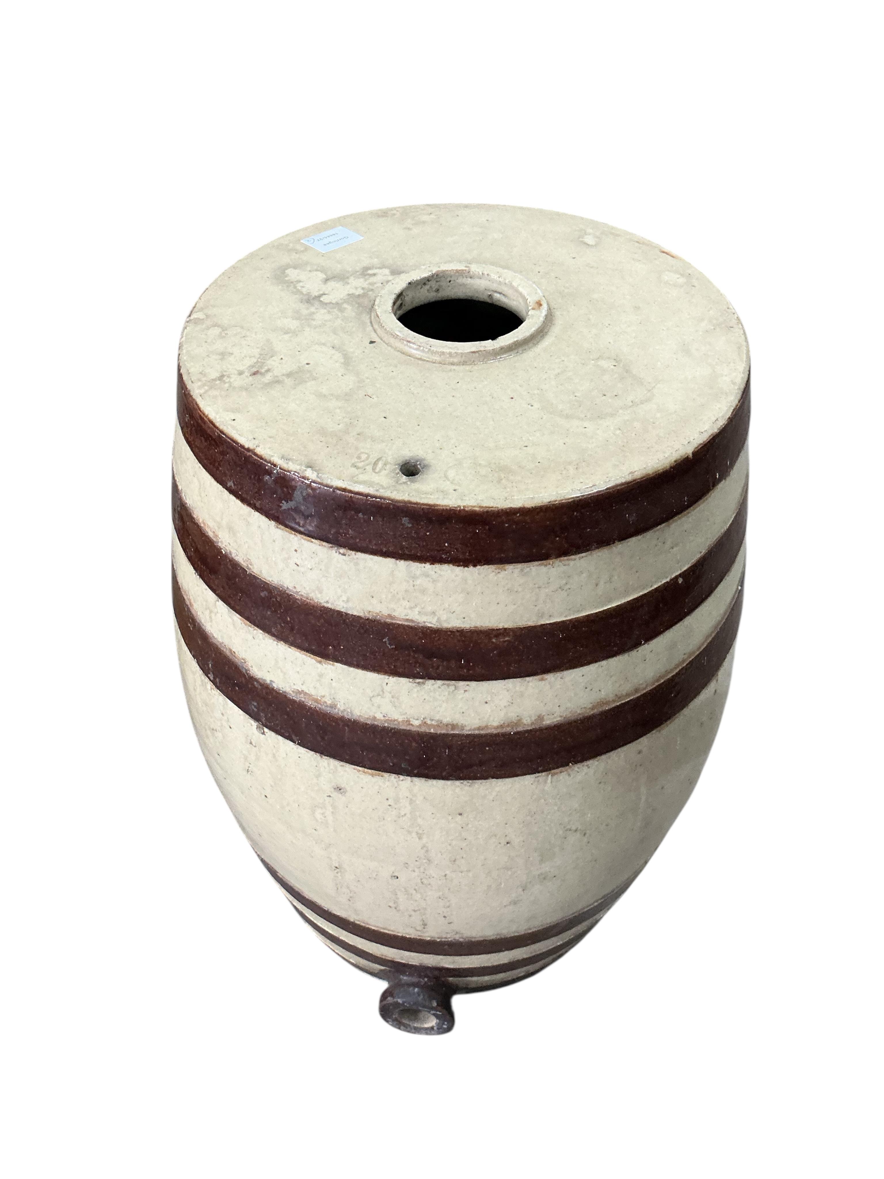 Two Victorian Doulton and Watts salt-glazed stoneware barrels, larger diameter 46cm, height 68cm, Provenance: The late Kenneth Turner (1936-2025), celebrity florist, designer and perfume retailer, he received the Royal W